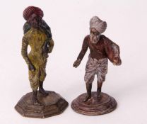 Two painted cast brass Indian figures, modelled in the form of a holy man and a merchant, heights