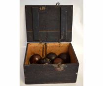19th century pine box containing 8 lignum vitae bowls and a further old Bussey & Co Ltd of London