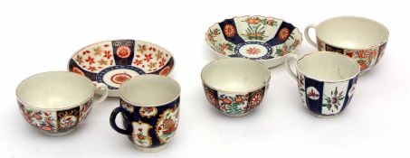 Collection of 18th century Worcester blue ground cups and saucers with Queens pattern and other