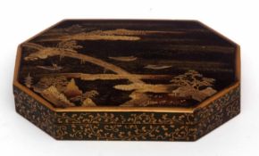Japanese papier mache box and cover with applied gilt decoration, the cover with a Japanese island