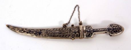 20th century white metal and niello decorated Middle Eastern souvenir type dagger with curved