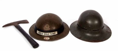 Mixed Lot: two various British steel fire helmets, the first dated 1939 with later decals and a