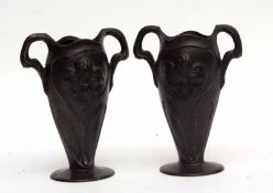 Pair of Art Nouveau style pewter two-handled vases, 16cms high