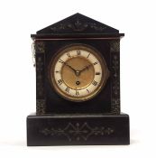 Late 19th century black and variegated marble mantel timepiece, the architectural case on a plinth