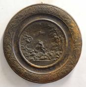 Metal plaque with a classical scene with inscription in German below within a scroll border, 43cms