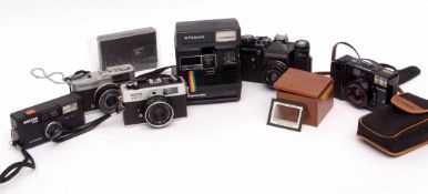 Mixed Lot: various late 20th century cameras including Polaroid, Ricoh, Olympia 35, Hanimex,