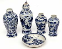 Collection of four Chinese 19th century vases with various blue and white designs, largest 18cms