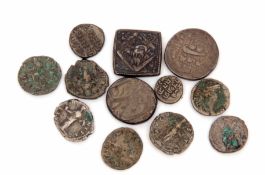 Mixed Lot: seven various Roman type white metal coins together with five further Middle Eastern