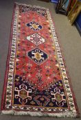 Late 20th century Caucasian wool runner, central panel with three lozenges, mainly red, beige and