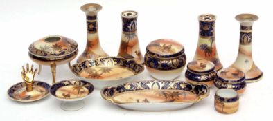 Group of Noritake wares decorated in blue ground and gilt tooling with pin trays, jars and covers