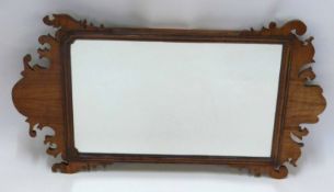 Chippendale style mahogany wall mirror with fretwork cut frame, 69cms high