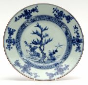 18th century Chinese export plate with brown line rim decorated with flowers within a blue cell