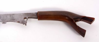 South East Asian horn handled short sword with shaped and polished blade to a carved horn handle