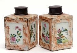 Pair of late 19th century Chinese porcelain tea caddies of square section, the pink ground with