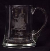 Late 20th century clear glass mug with applied handle and etched detail for the Norfolk Regiment,