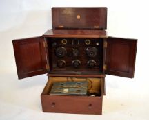 First half of 20th century mahogany cased valve radio receiver of rectangular form with hinged