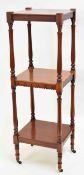 Mahogany three-tier whatnot with ring turned supports, 41cms wide