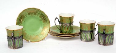 Group of four late 19th/early 20th century Coalport coffee cups and saucers with silver holders