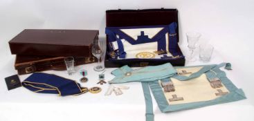 Mixed Lot: Masonic regalia comprising three leather suitcases each containing aprons and sashes