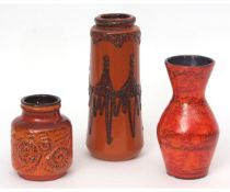 Group of three pieces of West German pottery with a red glazed and applied design, the largest 27cms
