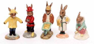 Collection of five Bunnikins figures including Fireman Bunnikins and Gardener Bunnikins