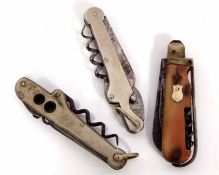 Mixed Lot: three various folding utility tools, two with base metal grips, the third with bone