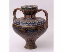 Large pottery Italian Majolica vase decorated in Castelli style with crossed handles and cover,