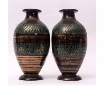 Large pair of Studio Pottery ovoid vases with green lustre design, the bases with signature for
