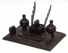 African hardwood ink stand circa early 20th century, 24cms wide