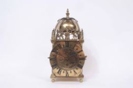 Mid-20th century cast brass mantel timepiece with passing strike and modelled in the form of a