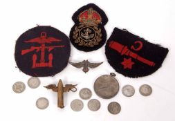 Mixed Lot: three various cloth badges, RAF sweetheart brooch, single cap badge, silver tug of war