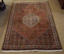 Late 20th century Caucasian wool small carpet, two central graduated hexagonal lozenges and