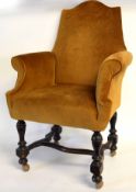 Late 19th/early 20th century easy chair, upholstered in plain mustard, ring turned supports and H
