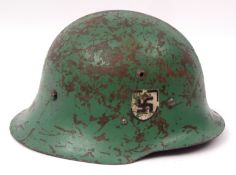 Austrian M 1916/1917 steel helmet with painted green finish and applied decal, fitted with a