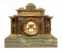 Early 20th century green onyx and gilt metal mounted mantel clock, the architectural case with