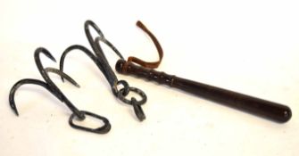 Mixed Lot: two black painted steel grappling hooks? together with a turned hardwood truncheon with