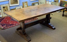 Jack Grimble 20th century oak refectory table on spreading chamfered supports with splayed feet