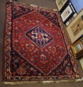 Late 20th century Caucasian carpet, single central lozenge, tree of life designs, mainly red and