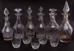 Group of 19th century cut glass decanters, four with tear-drop stoppers, with five tumblers with
