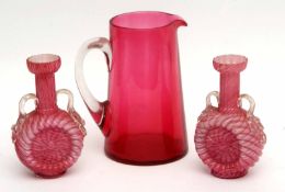Glass cranberry ewer and two pink glass vases