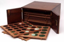 Late 20th century wooden coin collectors cabinet of square form with hinged locking doors and