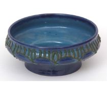 Former East Germany Strehla pottery bowl, decorated with green applied design on blue glaze, 18cms