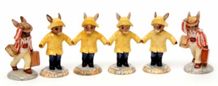 Collection of six Bunnikins figures including Father Bunnikins, Rainy Day Bunnikins