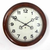 Early 20th century walnut cased dial timepiece, the sectioned and moulded surround to a spun brass