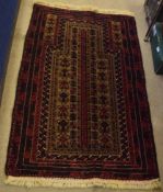 Caucasian style small wool carpet, central geometric lozenge, mainly red and brown field, 135 x