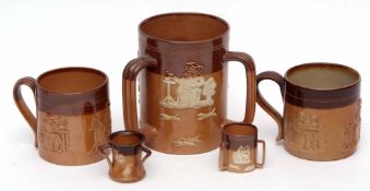 Collection of Royal Doulton Harvest ware including a tyg, two mugs and two further miniature