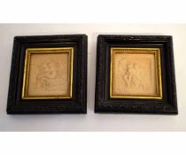 Two carved alabaster type panels in wooden frames