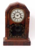 Late 19th century walnut cased mantel clock with faceted top hinged and glazed door on a plinth base