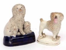 Pair of Staffordshire spaniels, late 19th century,