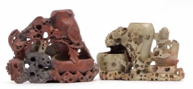 Pair of Oriental soapstone carvings with rockwork, two small dishes and flowers